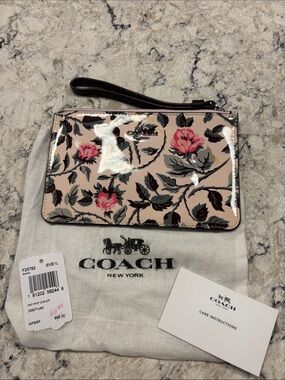Coach Floral Patent Leather Wristlet in Blush and Pink